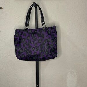 Coach Black and Purple EUC Animal Print Tote, small cracks on handles.